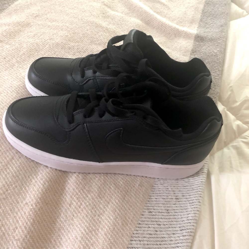 Woman’s Nike Court sneakers.  Never worn.